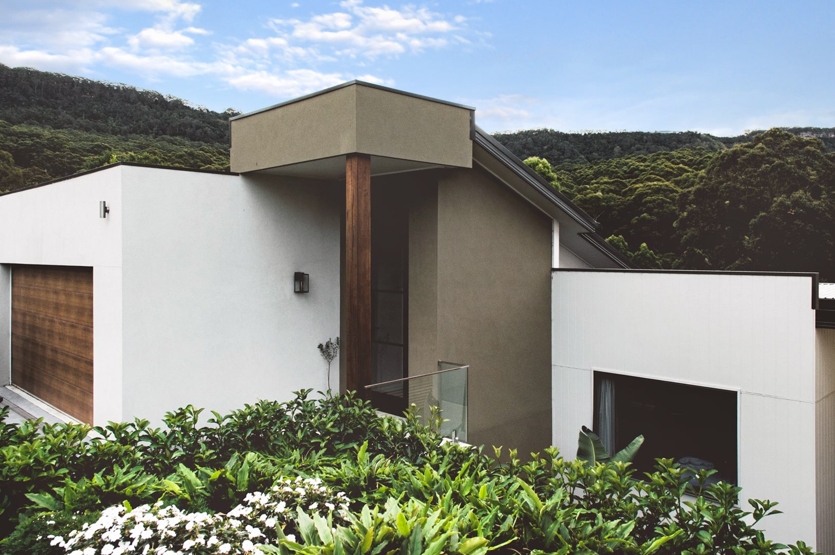 Custom Bulli home set against the Illawarra Escarpment by Adlington Homes
