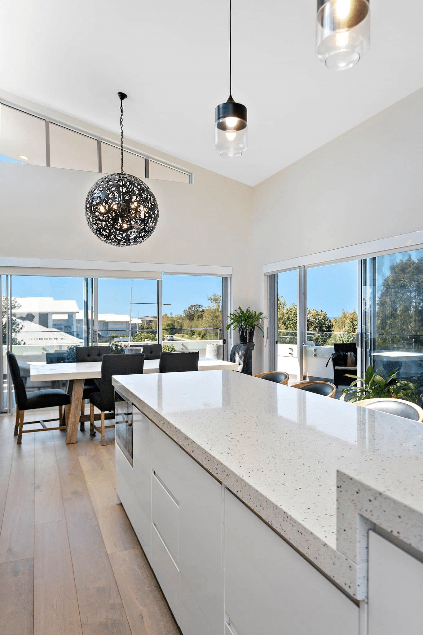 Open-plan kitchen with a bright outlook in an Adlington custom home